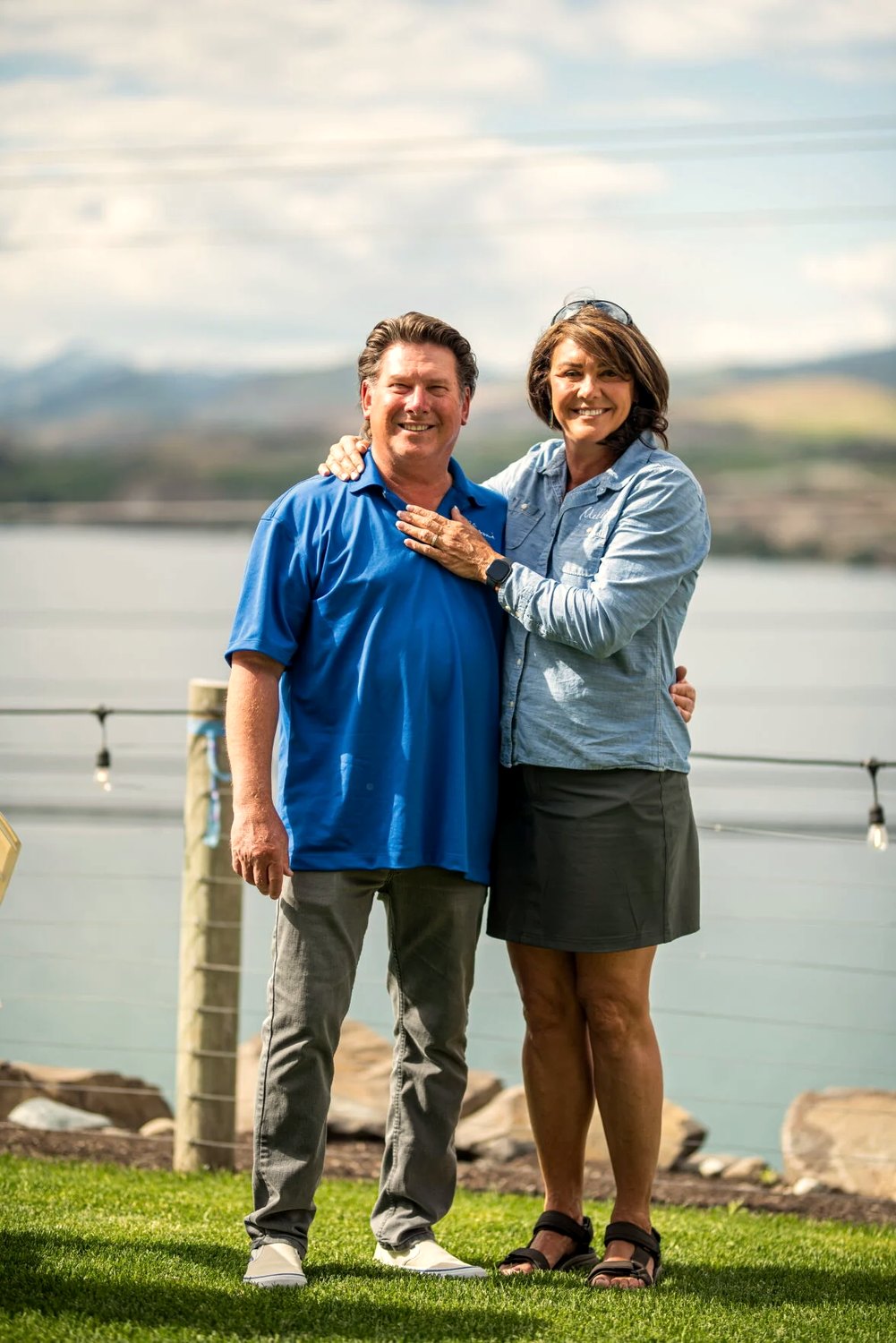 Rob and Donna Mellison on the lawn above Lake Chelan